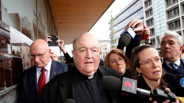 Archbishop Philip Wilson leaves Newcastle Local Court