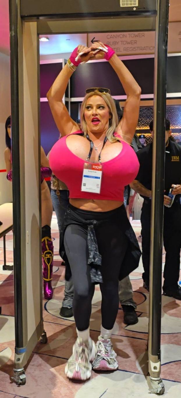 Adult Star Lexi Cox Shows Off Her Curves In Small Pink Top As She Attends The AVN Convention And Speaks About Donald Trump In Las Vegas, NV - 22 Jan 2025