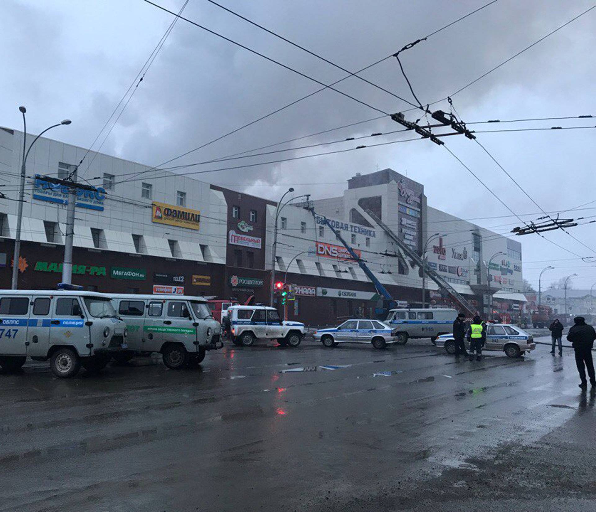Rescue personnel is seen on a site of fire at a shopping mall in Kemerovo