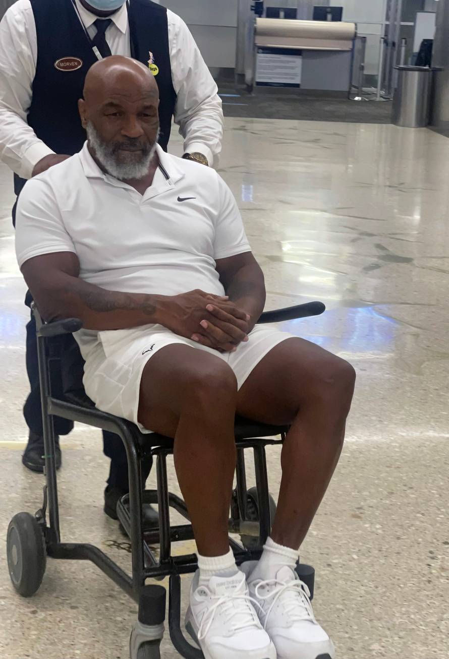 EXCLUSIVE: Mike Tyson is Pictured in a Wheelchair at Miami Airport