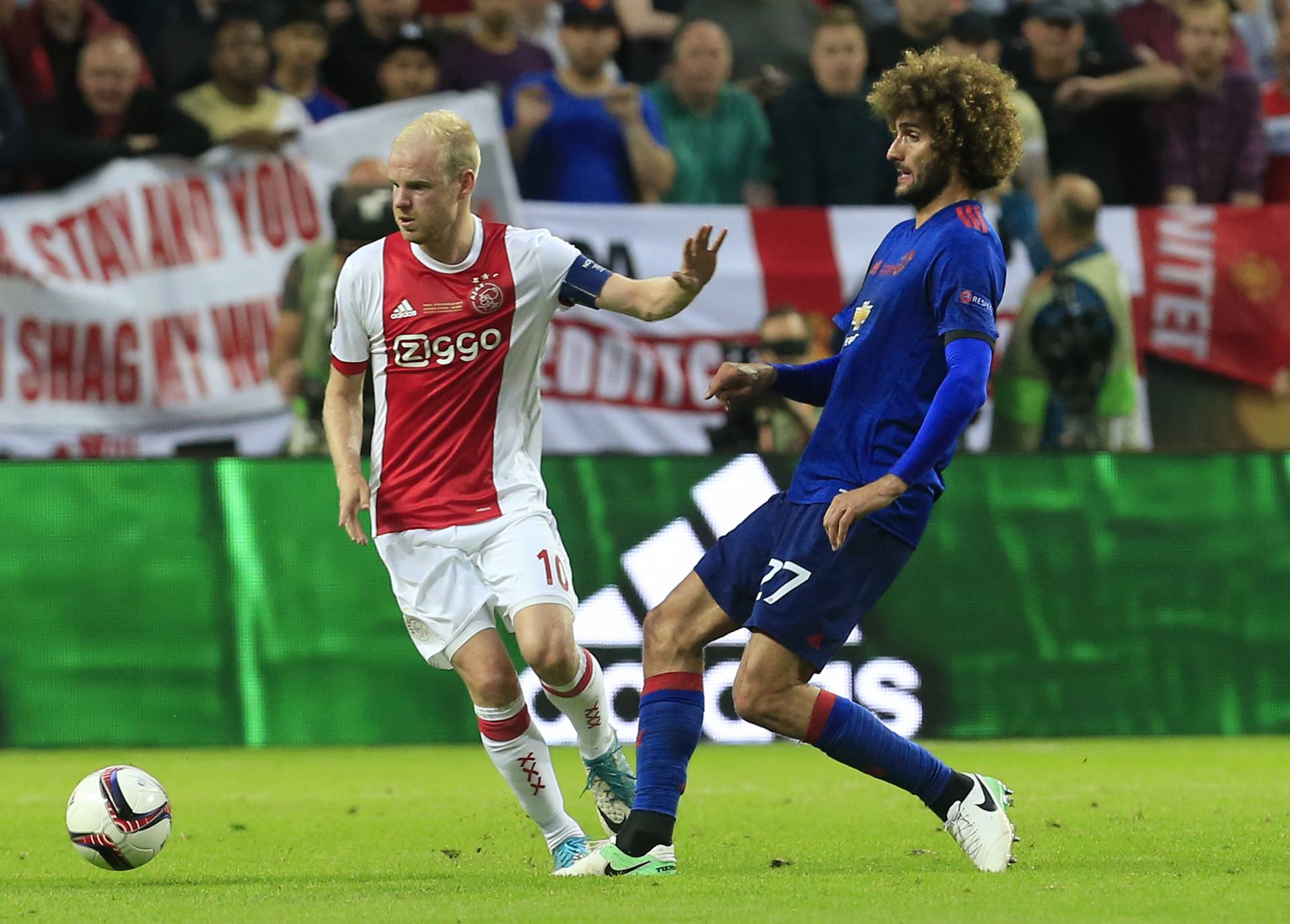 Ajax's Davy Klaassen in action with Manchester United's Marouane Fellaini