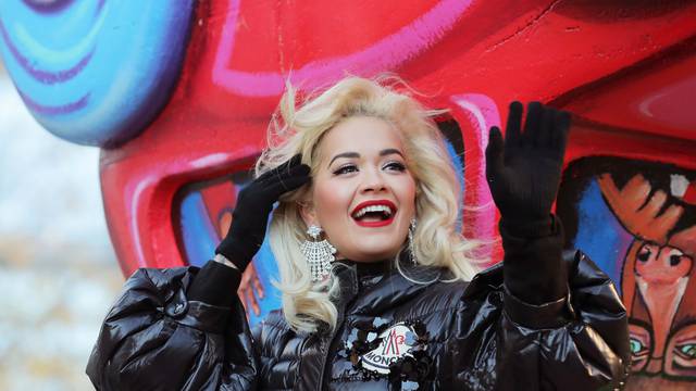 Singer Rita Ora waves to the crowd during the Macy's Thanksgiving Day Parade in Manhattan
