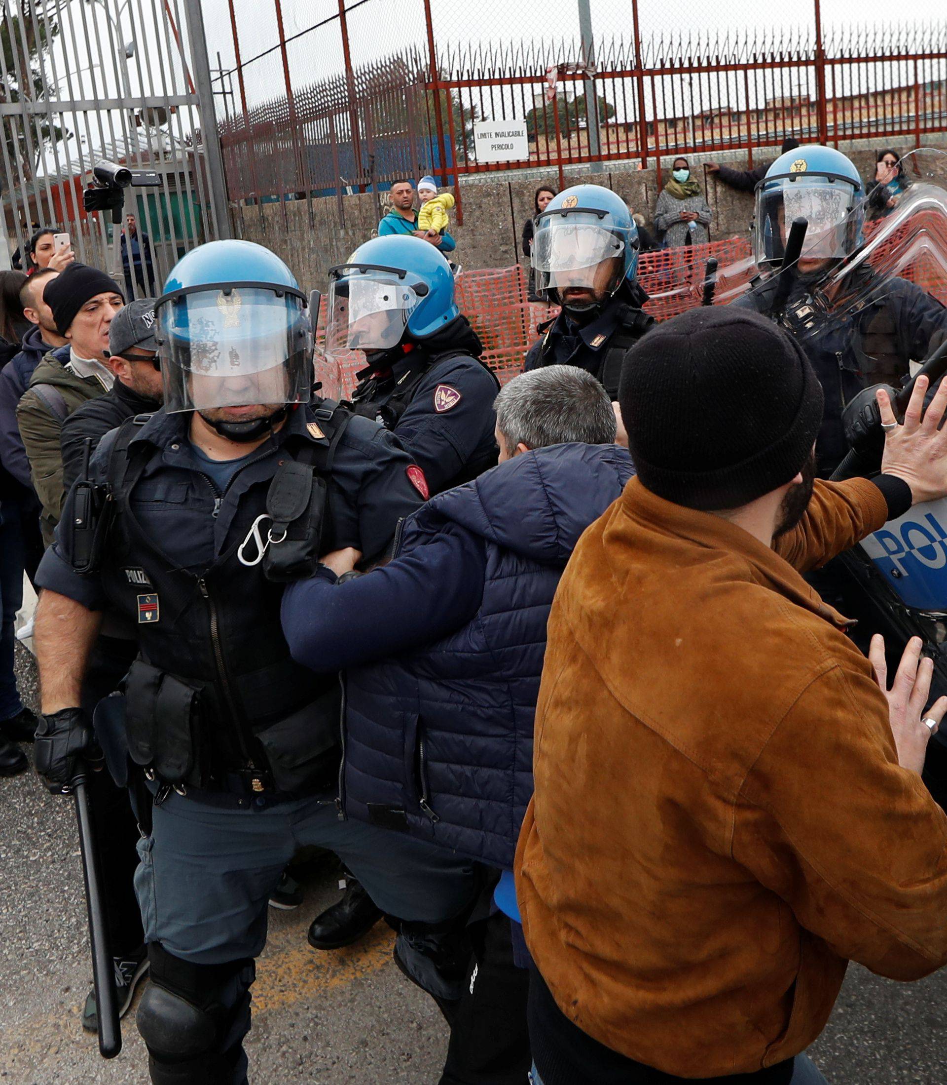 Prison inmates revolt after family visits were suspended due to fears over coronavirus contagion, in Rome