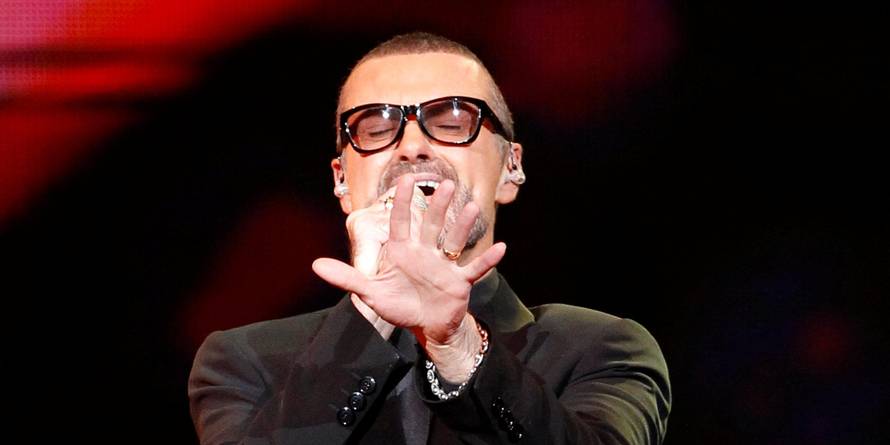 FILE PHOTO British singer George Michael performs on stage during his "Symphonica" tour concert in Berlin