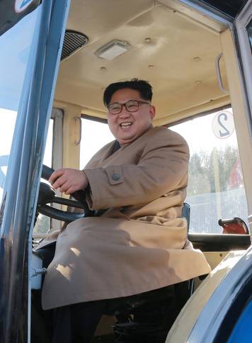 North Korean leader Kim Jong Un gives field guidance to the Kumsong Tractor Factory in this undated picture provided by KCNA