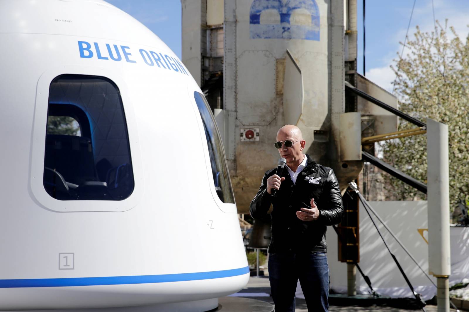 FILE PHOTO: Amazon and Blue Origin founder Jeff Bezos addresses the media about the New Shepard rocket booster and Crew Capsule mockup at the 33rd Space Symposium in Colorado Springs