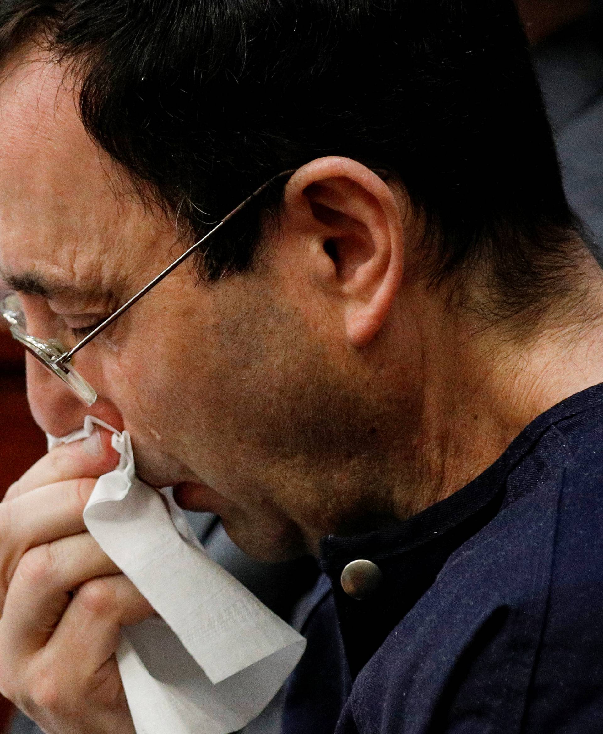 Larry Nassar, a former team USA Gymnastics doctor who pleaded guilty in November 2017 to sexual assault charges, sits in the courtroom during his sentencing hearing in Lansing, Michigan