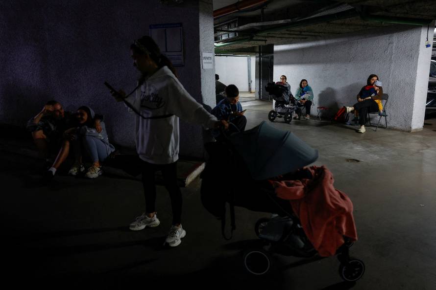 Residents take shelter during Russian drone and missile attacks in Kyiv