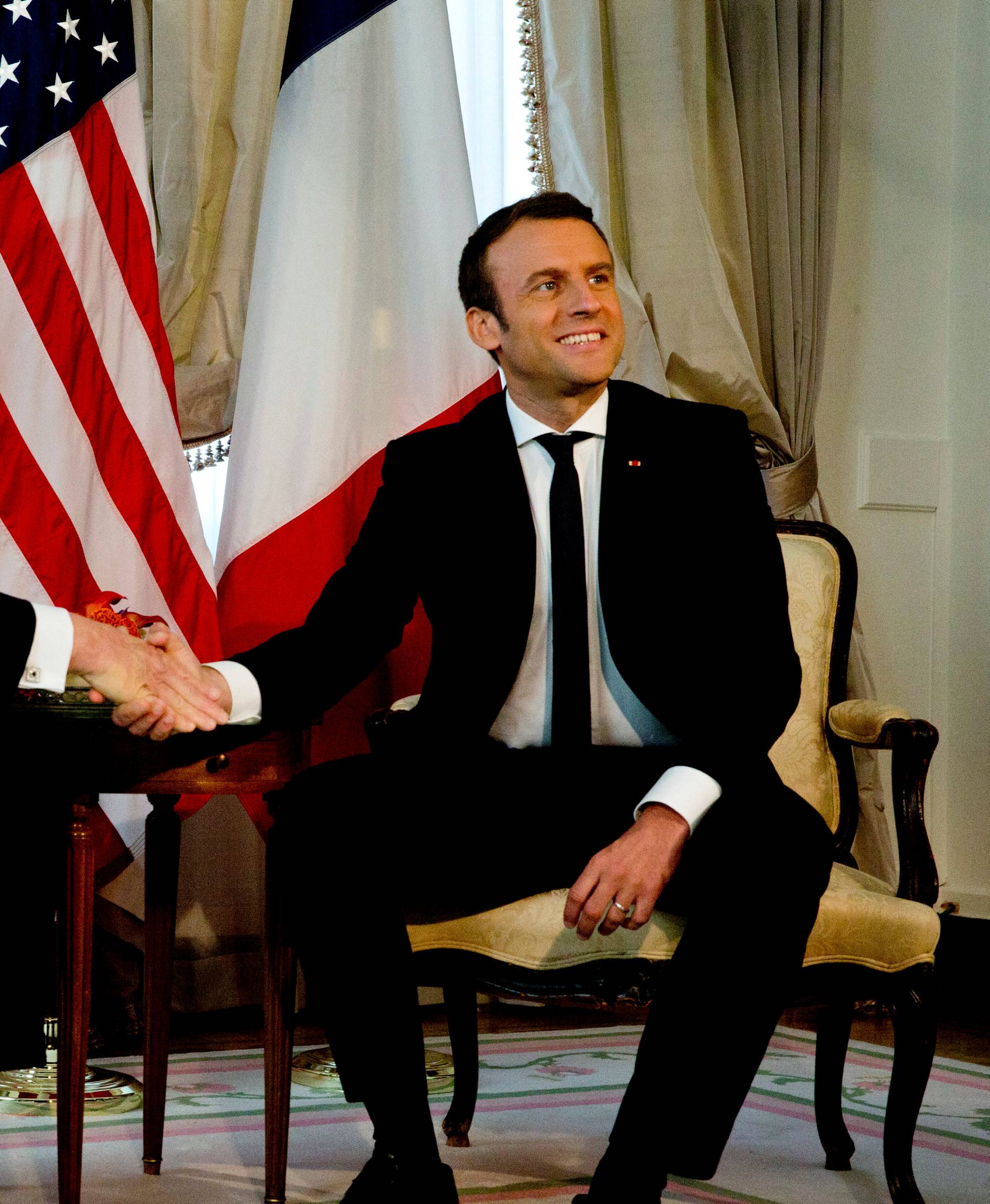U.S. President Donald Trump meets French President Emmanuel Macron before a working lunch ahead of a NATO Summit in Brussels