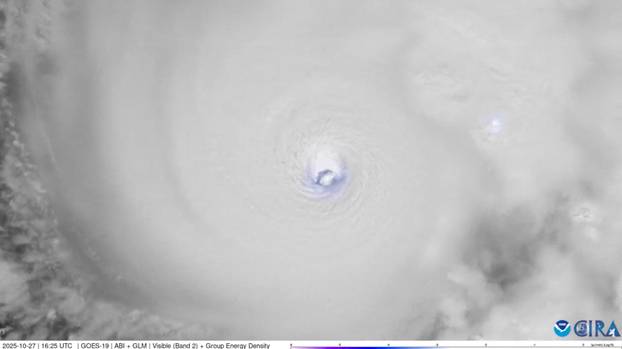 Lightning flashes within the eye of Hurricane Melissa over the Caribbean Sea