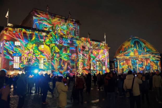 The Berlin State Opera house and  St. Hedwig's Cathedral are illuminated during the Festival of Lights in Berlin