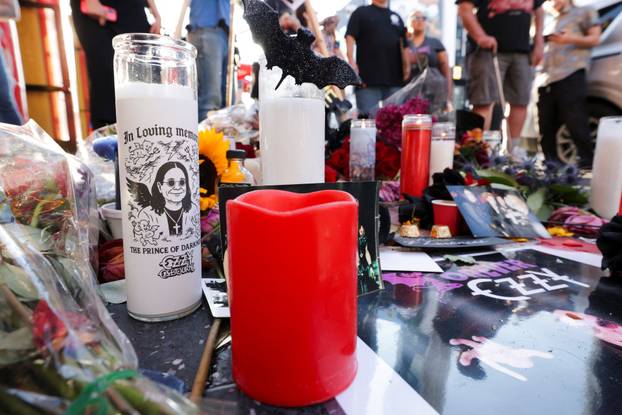 Flowers and pictures are placed on the star of late Ozzy Osbourne at the Hollywood Walk of Fame in Los Angeles