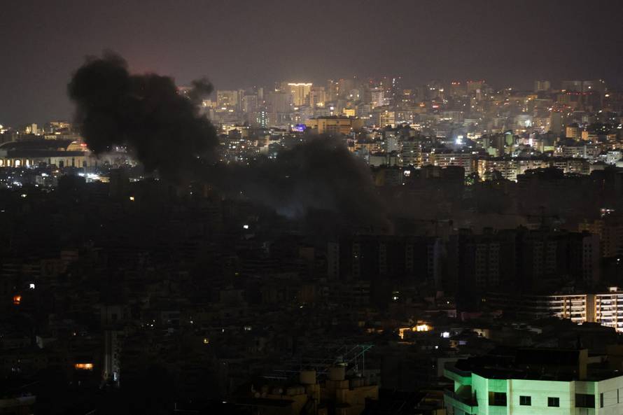 Smoke rises after Israeli strikes on Beirut's southern suburbs, following an escalation between Hezbollah and Israel amid the U.S.-Israeli conflict with Iran