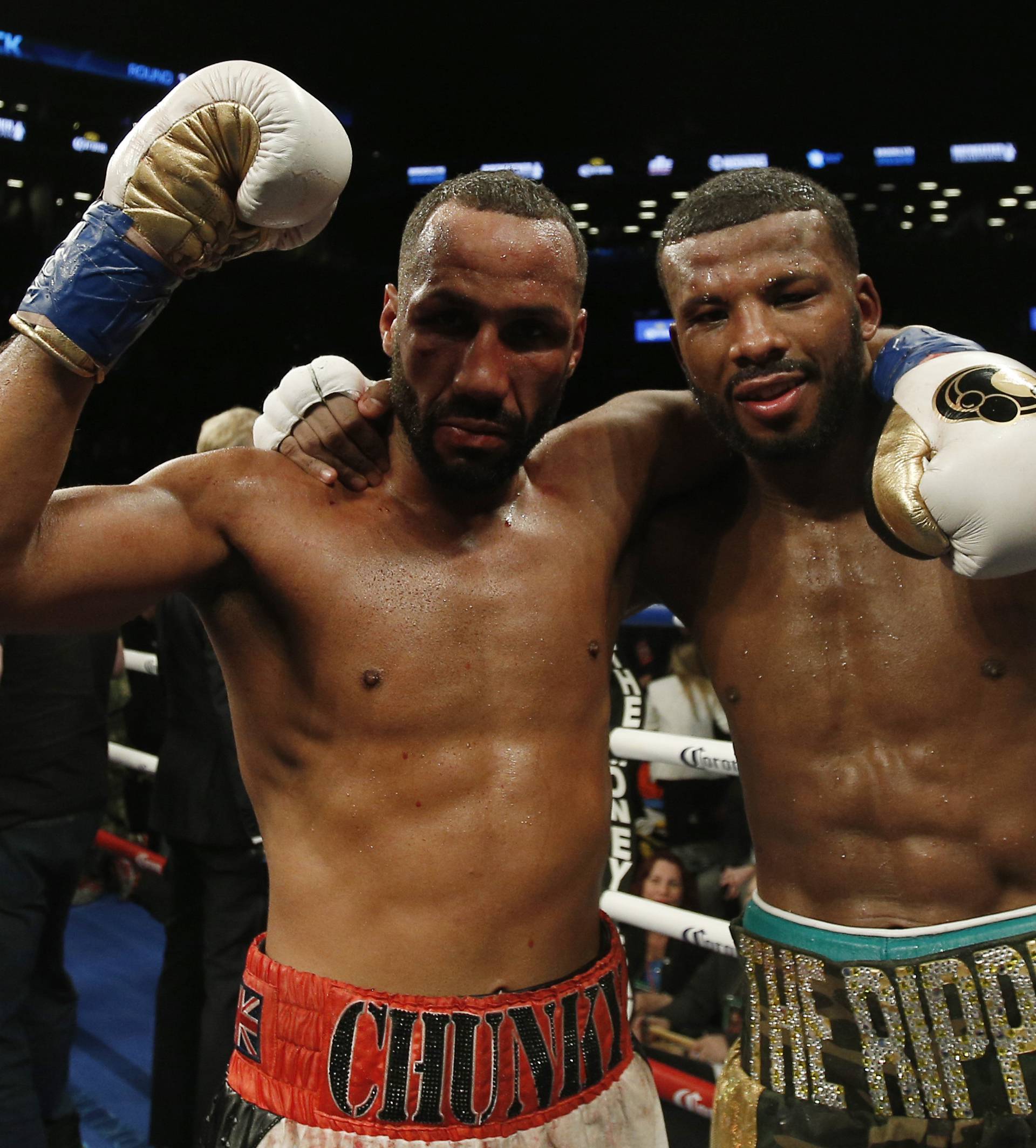 James DeGale and Badou Jack celebrate after their fight which ended in a draw