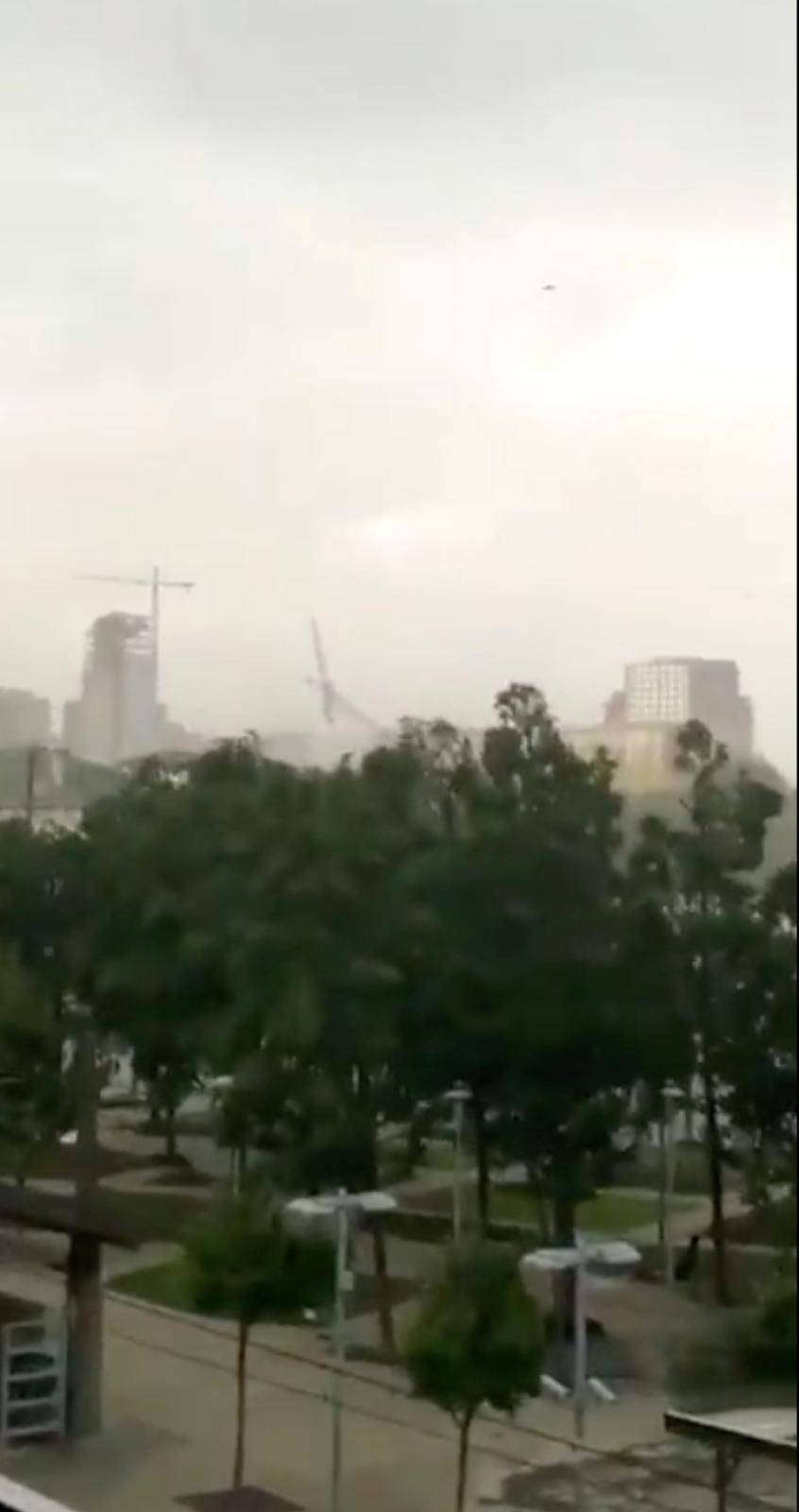 A construction crane collapses amidst high winds in Dallas, Texas