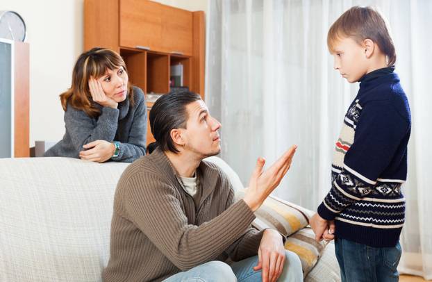 Parents berating their teenage child