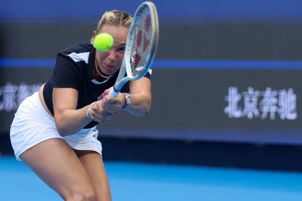 BEIJING, CHINA - SEPTEMBER 25: Donna Vekic of Croatia returns a shot in the Women s Singles Round of 128 match against C