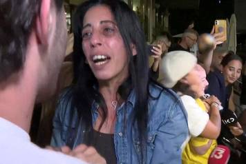 Einav Zangauker, the mother of hostage Matan Zangauker, reacts to news that Israel and Hamas have agreed on Wednesday to the first phase of U.S. President Donald Trump's plan for Gaza, at Hostages Square in Tel Aviv
