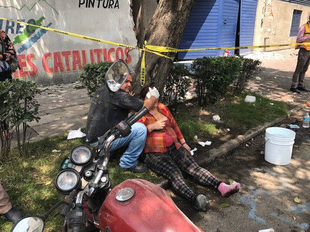 People are seen injured after an earthquake hit in Mexico City