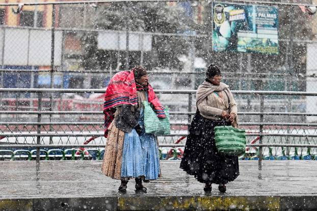 Snow falls amid low temperatures in Bolivia, in El Alto