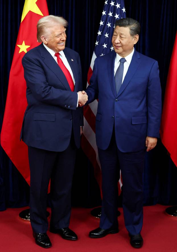 U.S. President Donald Trump meets with Chinese President Xi Jinping on the sidelines of the APEC summit, in Busan