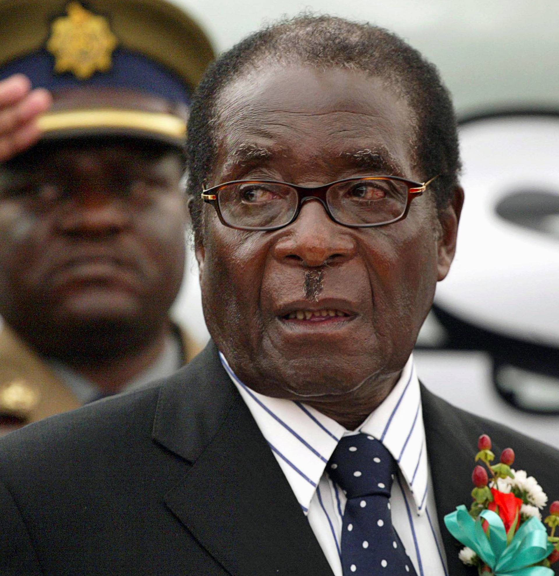 FILE PHOTO -  File photo of Zimbabwe President Mugabe attending the launch of basic commodities in Harare