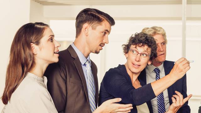 Serious businesspeople having discussion in office