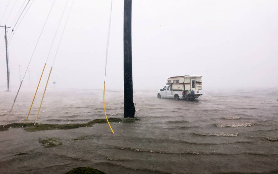 Craig "Cajun" Uggen, 57, nearly floods his truck as Hurricane Harvey comes ashore in Corpus Christi