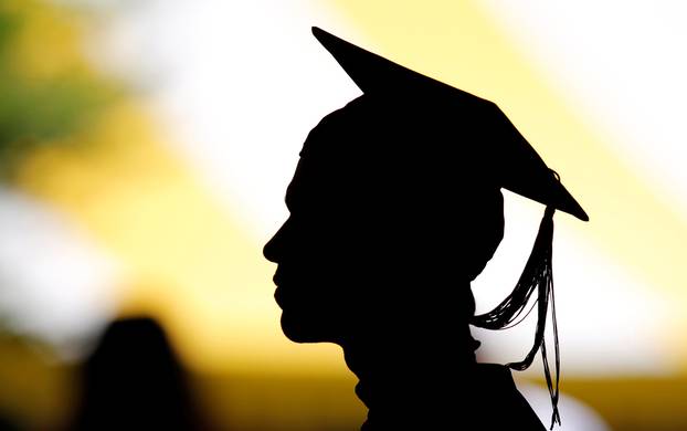 FILE PHOTO: Students take their seats for the diploma ceremony at Harvard University in Cambridge