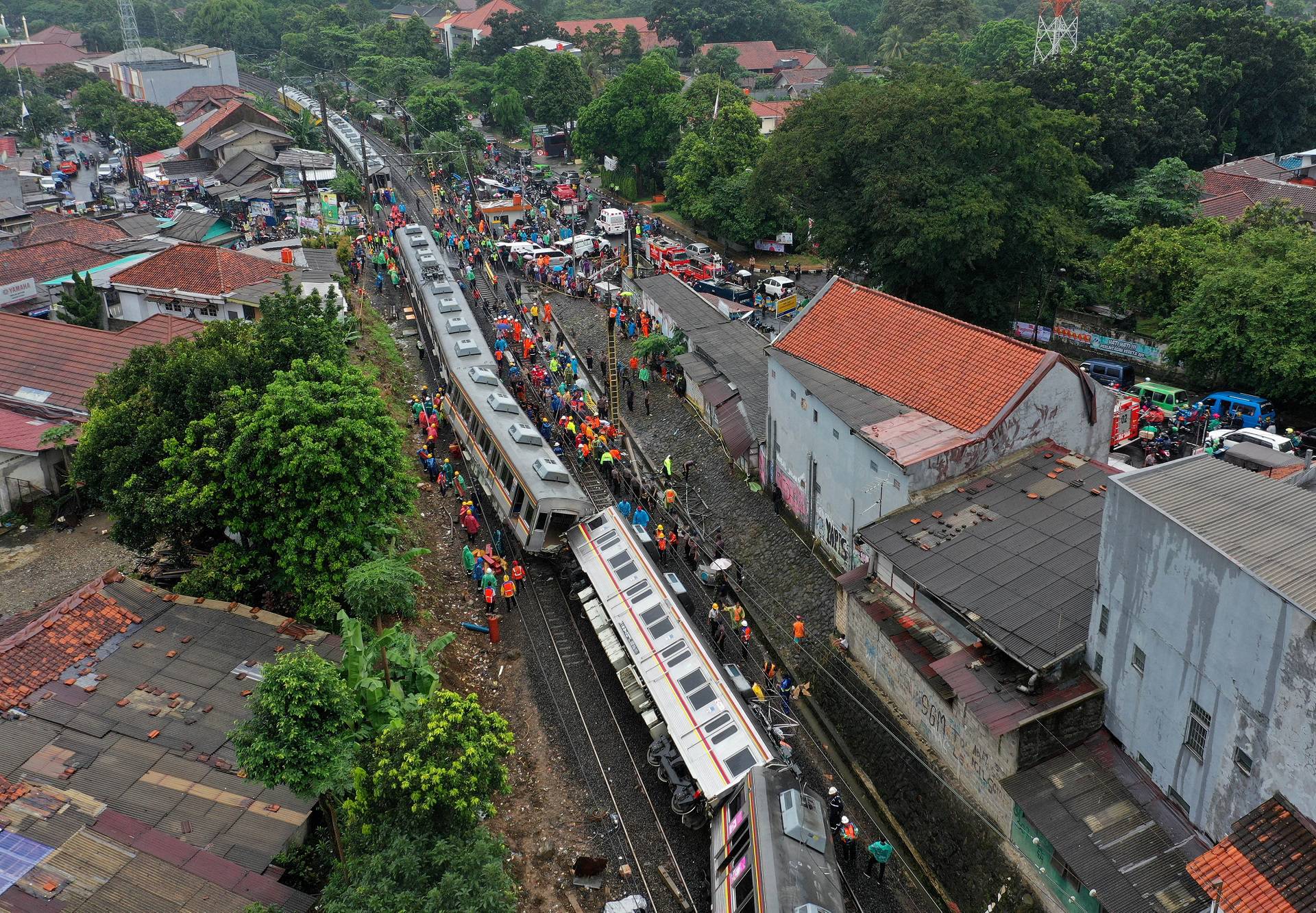 An aerial picture of a derailed commuter train in Bogor, West Java province