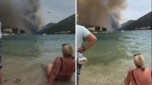 Požar u Dalmaciji nije omeo sve kupače na plaži: Neki iz plićaka prate borbu vatrogasca i vatre