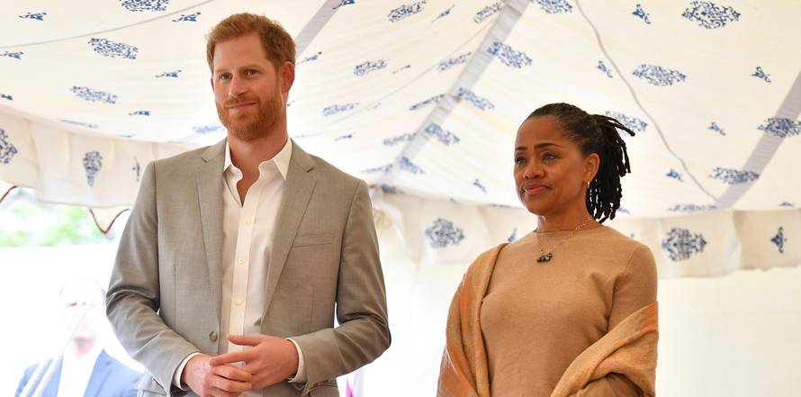 Britain's Prince Harry, and Doria Ragland listen to Meghan, Duchess of Sussex speaking at the launch of a cookbook with recipes from a group of women affected by the Grenfell Tower fire at Kensington Palace in London