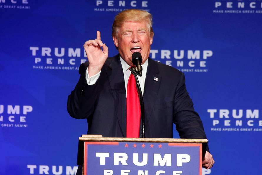 Republican presidential nominee Donald Trump speaks after returning to the stage following a security incident, where he was hustled off the stage by security agents due to a perceived threat in the crowd, during a campaign rally in Reno, Nevada