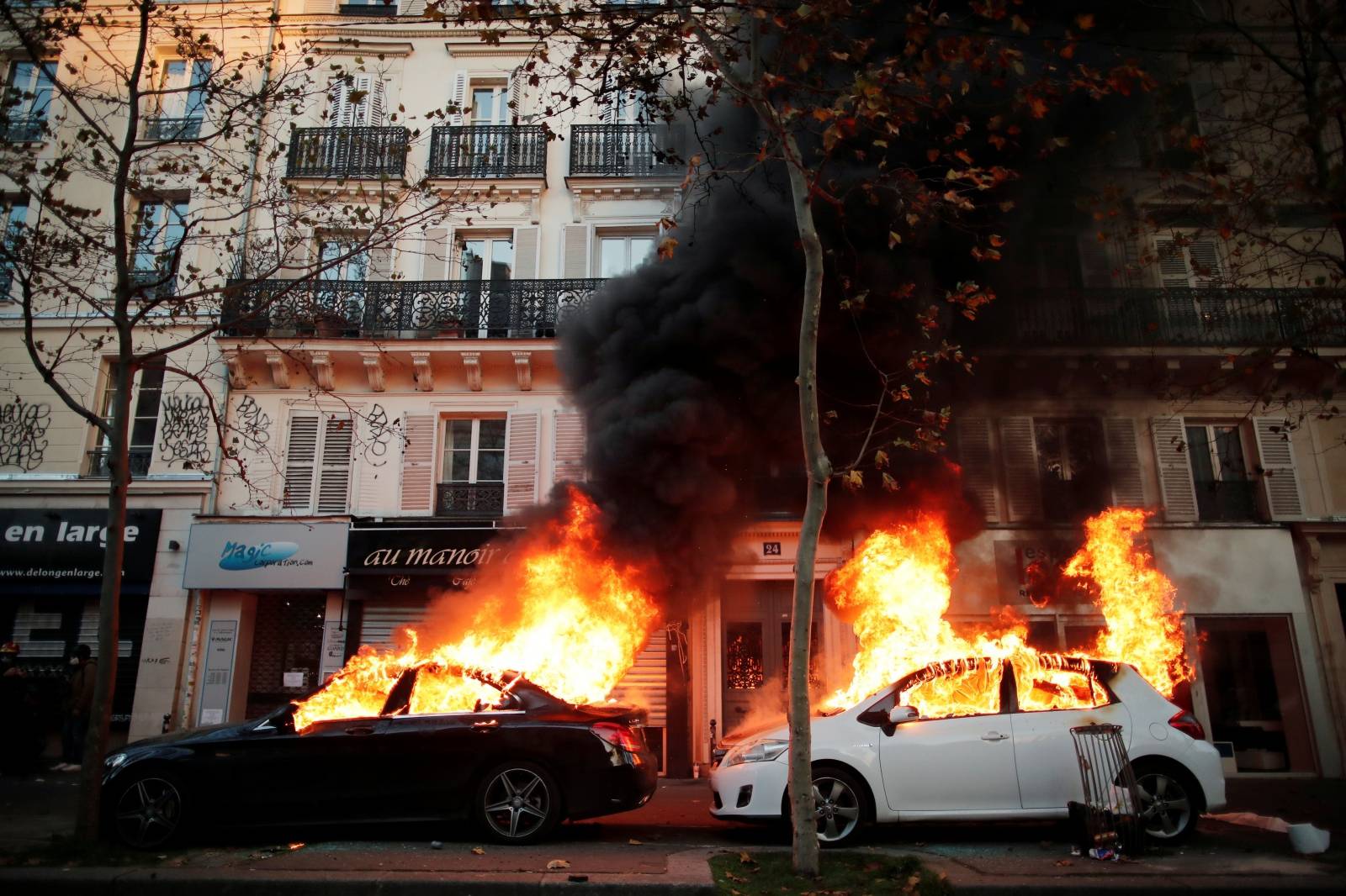 Protests over proposed curbs on identifying police, in Paris