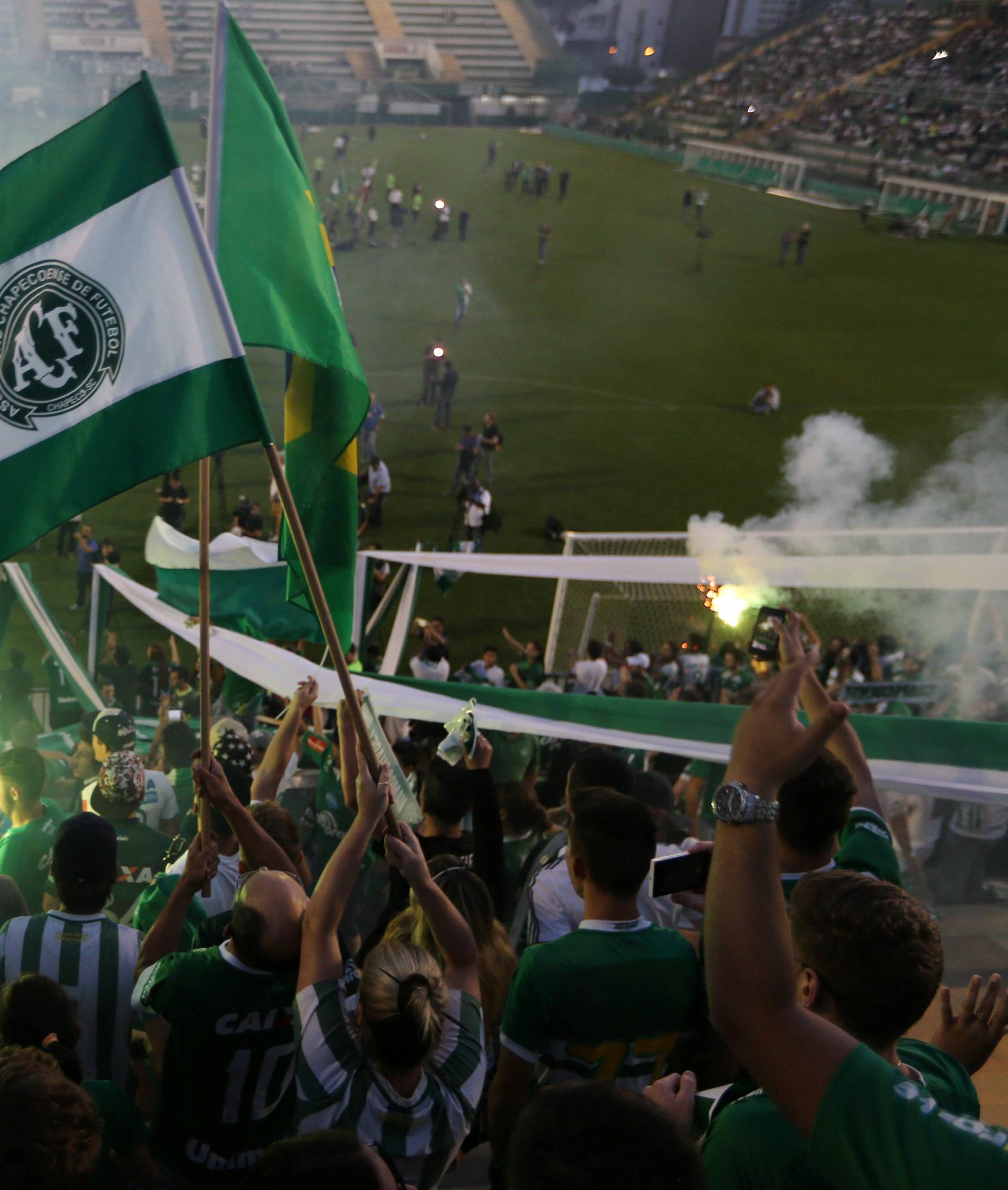 Fans of Chapecoense soccer team pay tribute to Chapecoense's players at the Arena Conda stadium in Chapeco