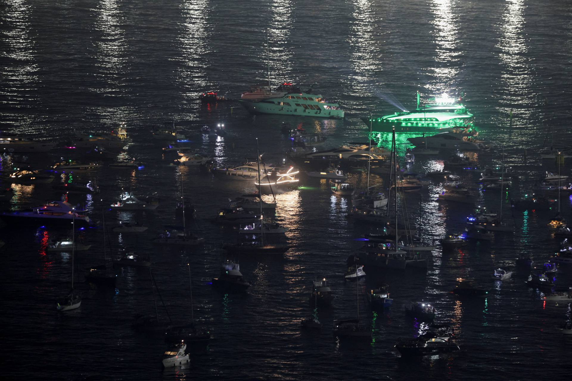 People gather for Madonna's concert at Copacabana beach, in Rio de Janeiro