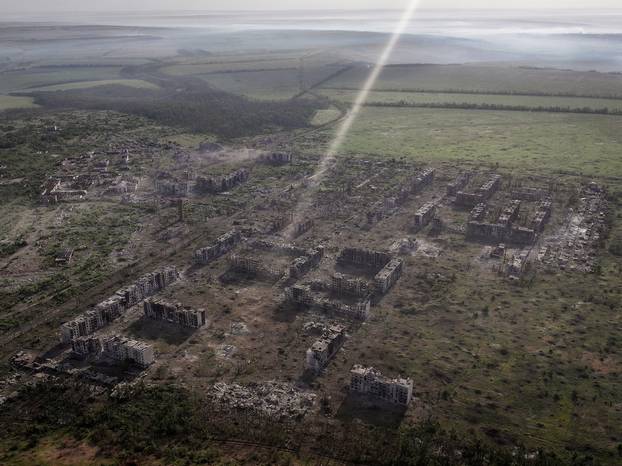 A drone view shows destroyed buildings in the frontline town of Chasiv Yar