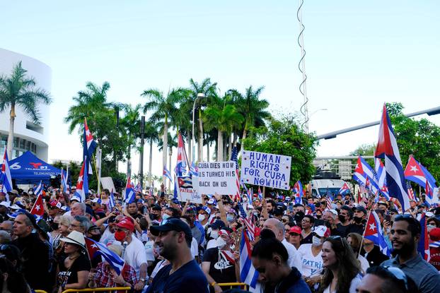 Emigres react to reports of protests in Cuba against its deteriorating economy, in Miami, Florida