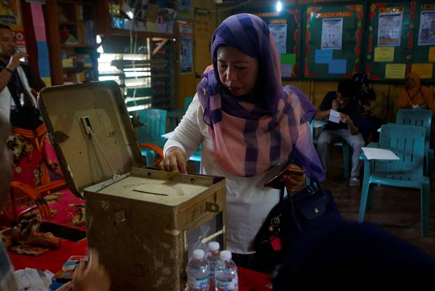 Woman casts her vote during the plebiscite on BOL at a voting precinct in Sultan Kudarat