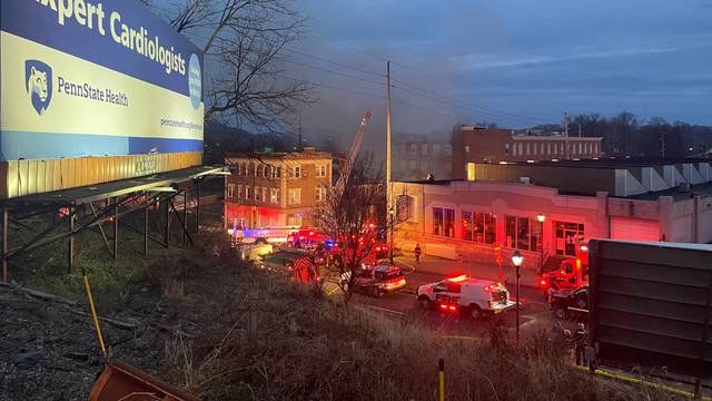 A general view shows smoke coming out from a chocolate factory after fire broke out, in West Reading