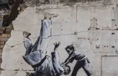Ukrao Banksyev mural u Kijevu: Htio prodati dio ploče grafita, prijeti mu do 12 godina zatvora