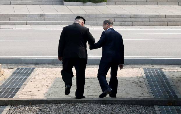 South Korean President Moon Jae-in and North Korean leader Kim Jong Un meet in the truce village of Panmunjom