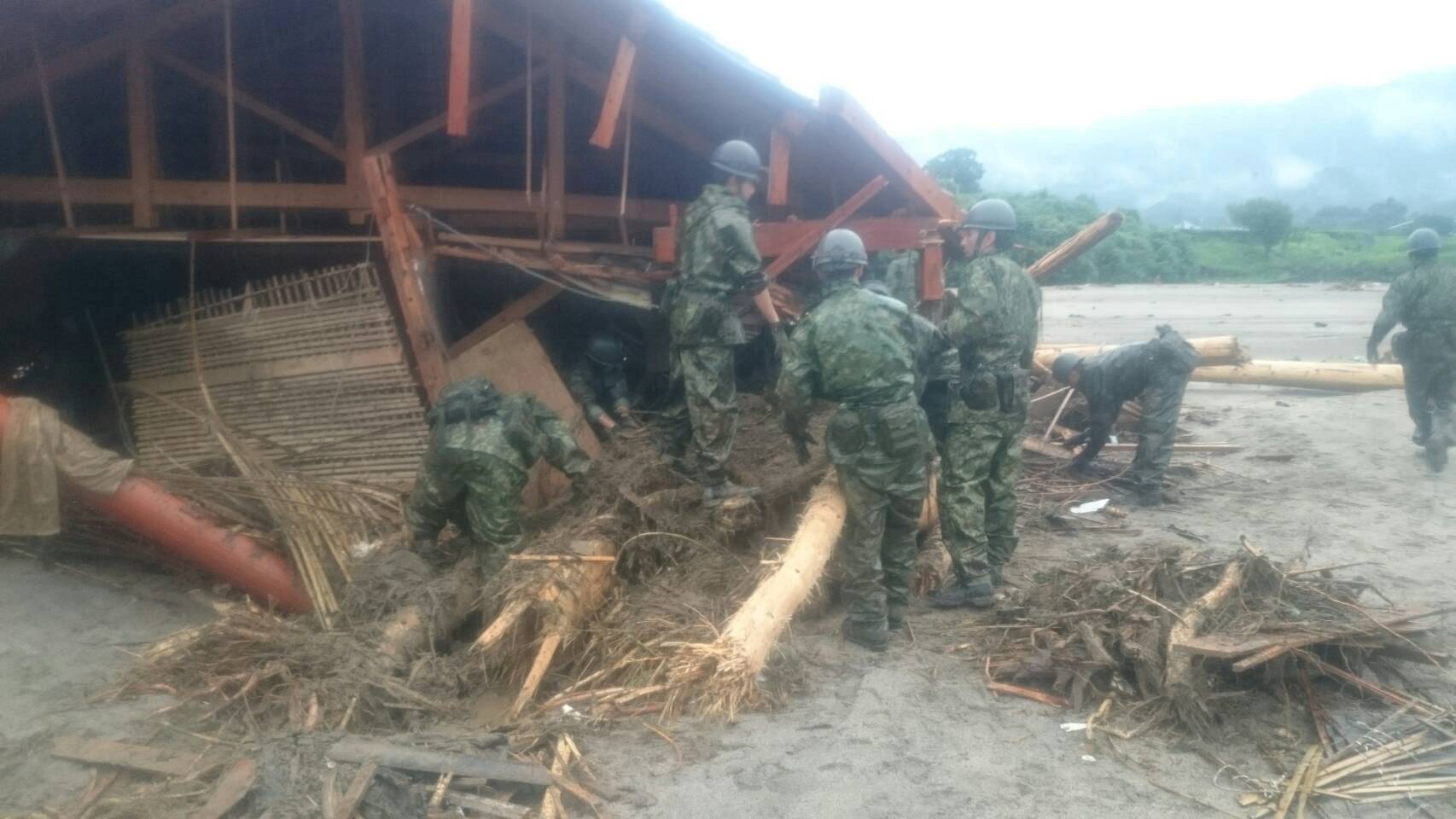 JSDF soldiers conduct rescue operations after heavy rain hit the area in Asakura