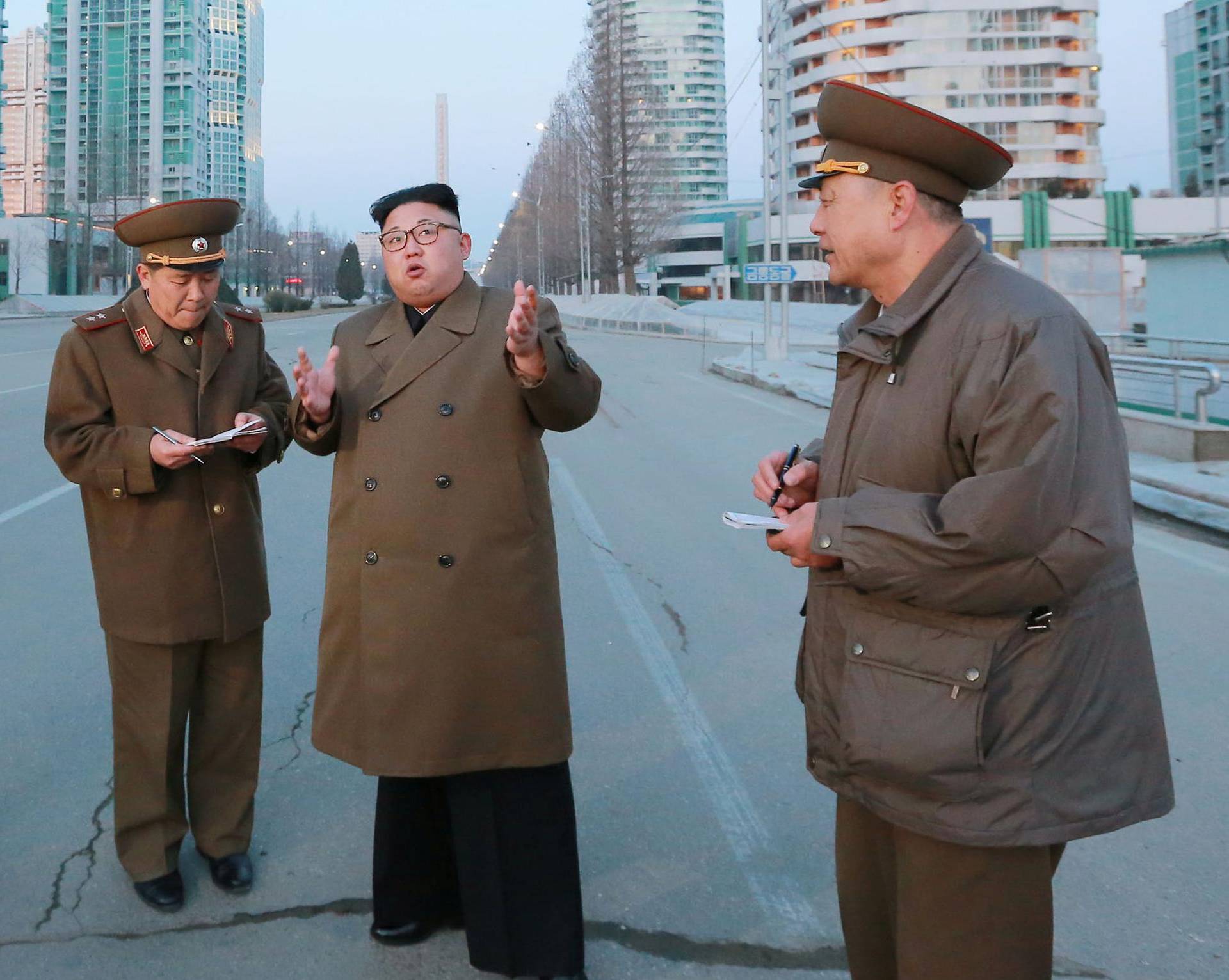 North Korean leader Kim Jong Un provides field guidance at the construction site of Ryomyong Street