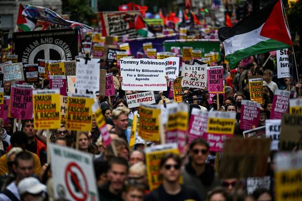 Anti-racism protesters gather to counter anti-immigration rally led by Tommy Robinson, in London