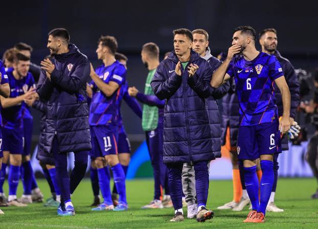 Slavlje hrvatskih igrača nakon pobjede u suretu sa Škotskom