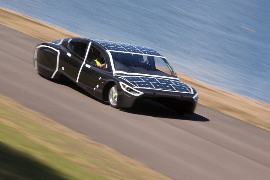 The University of New South Wales Sunswift team car named 'Violet' is driven during testing in Penrith western Sydney, Australia