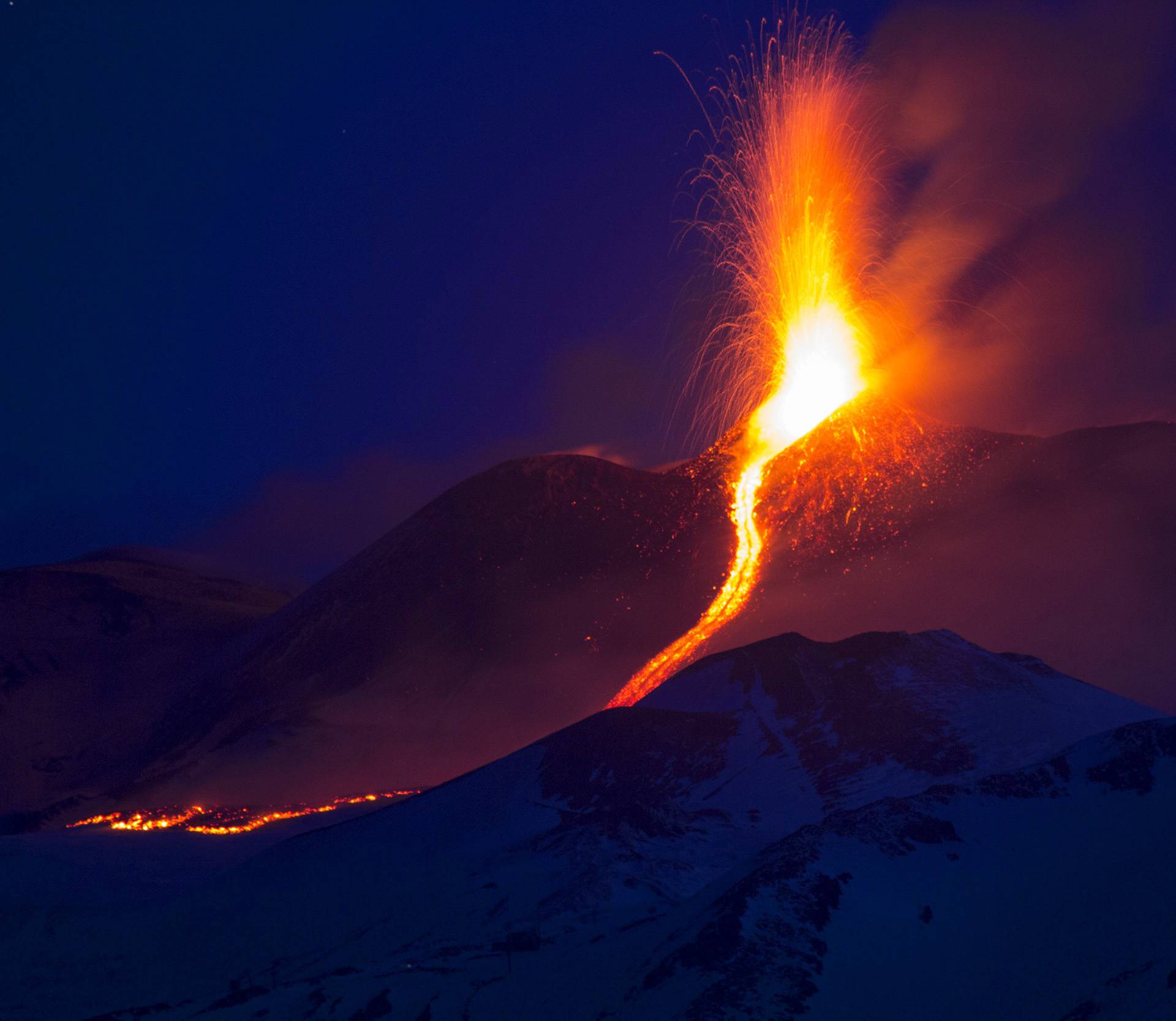 Nicolosi, Mount Etna erupting. The south east crater colors the nights of Catania