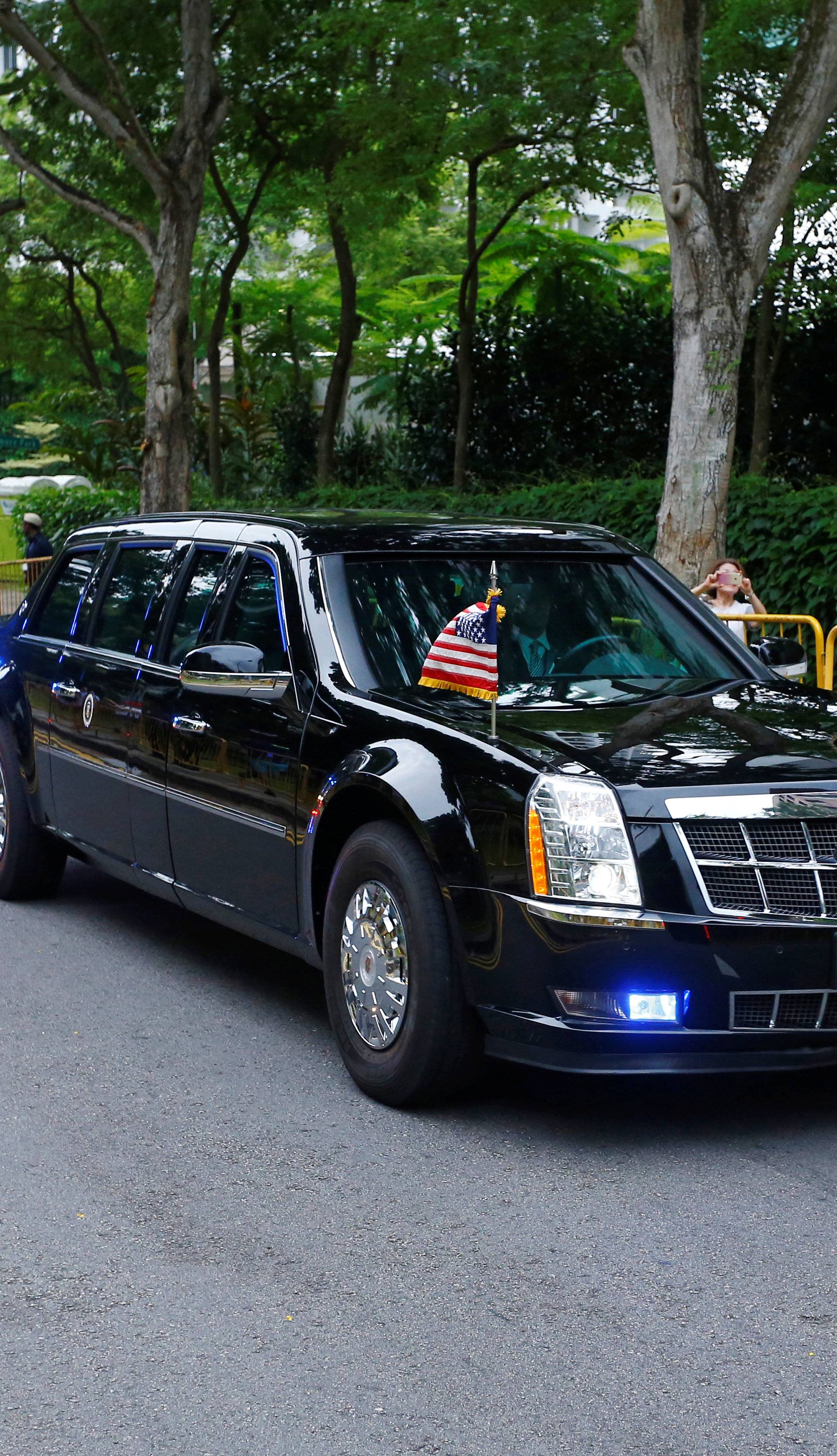 The motorcade of U.S. President Donald Trump travels towards Sentosa for his meeting with North Korean leader Kim Jong Un, in Singapore