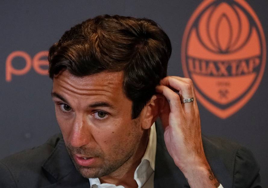 Former captain of Croatian national soccer team, Srna attends a news conference in Kiev